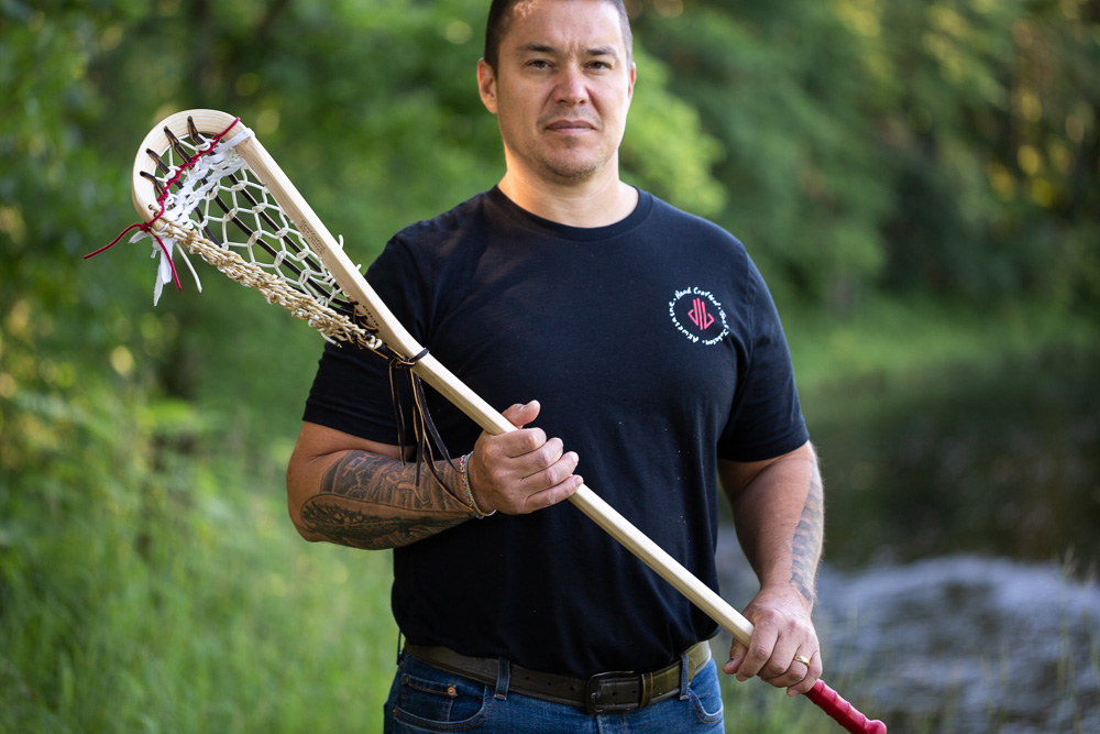 Jack Johnson with lacrosse stick